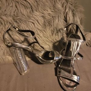 Silver and glittery block heels